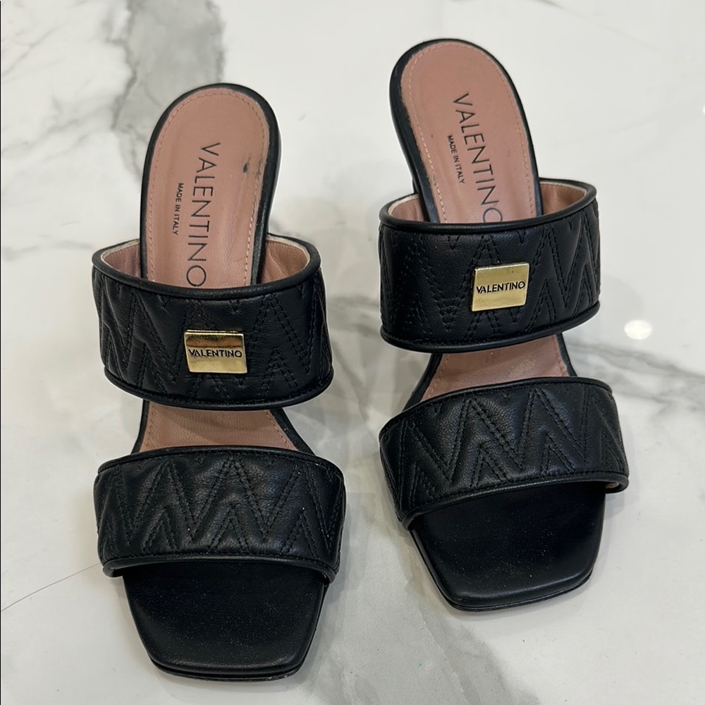 Valentino Black Quilted Mules with V Embossing